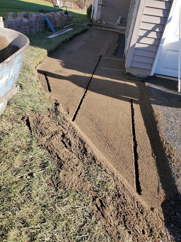 Sand base ready for side walkway pavers