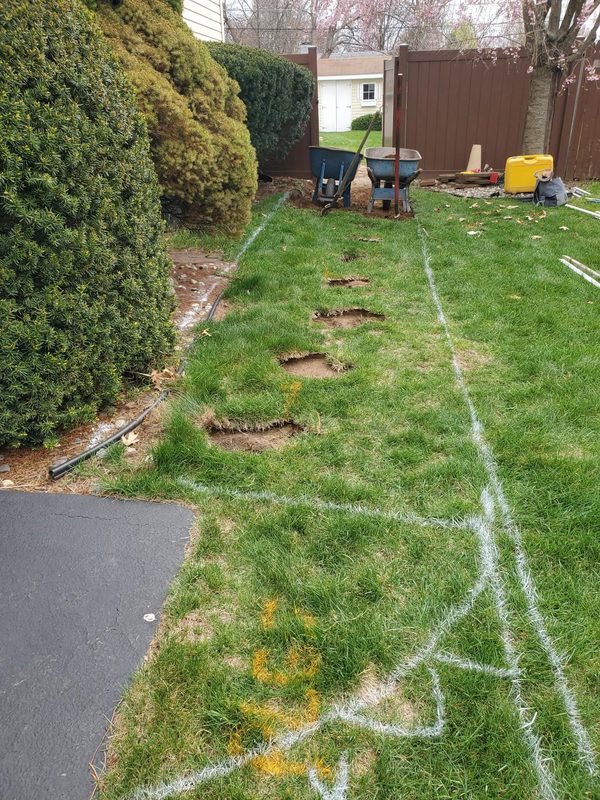 Layout planning with spray-paint marks on the grass