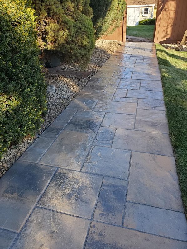 Completed slate walkway between fences
