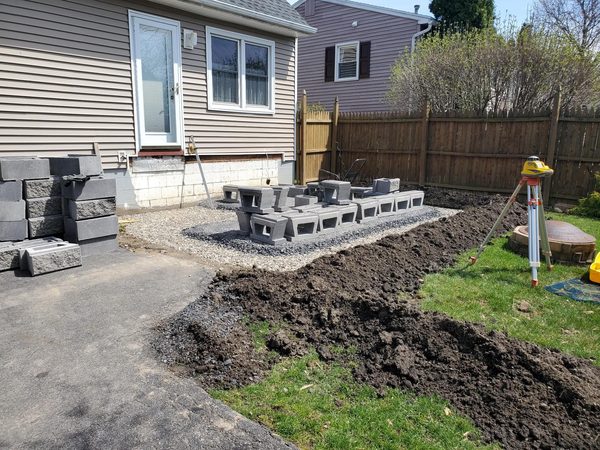 Cinder block retaining wall construction