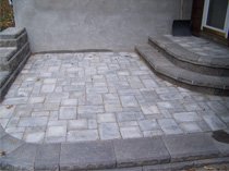 Patio with custom rounded steps